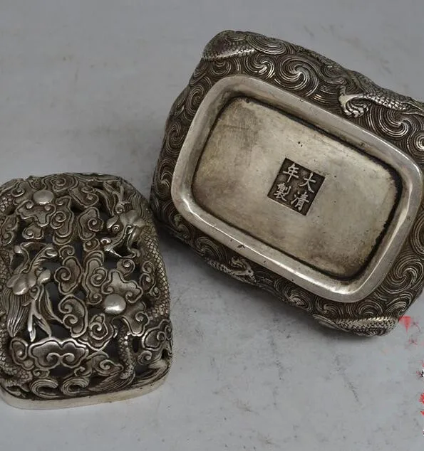 China collection archaize white copper dragon pattern hand carrying Incense burner
China collection archaize white copper dragon pattern hand carrying Incense burner