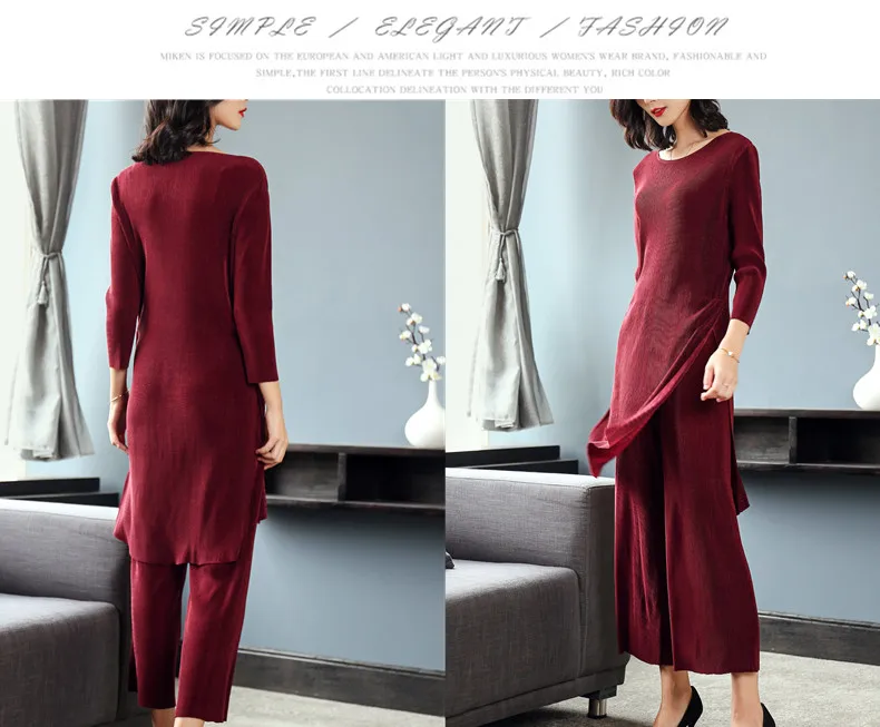 Fashion fold three quarter solid o-neck irregular long T-shirt before open fork ankle-length pants two-piece outfit IN STOCK
Fashion fold three quarter solid o-neck irregular long T-shirt before open fork ankle-length pants two-piece outfit IN STOCK