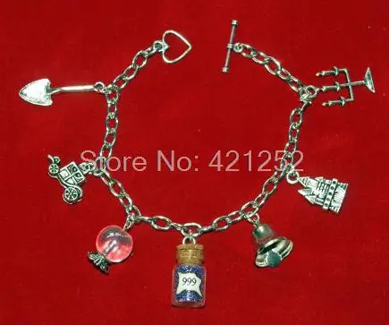 

12pcs Haunted Mansion 7 Charm Bracelet, Crystal Ball, 999 Happy Haunts charm bracelets