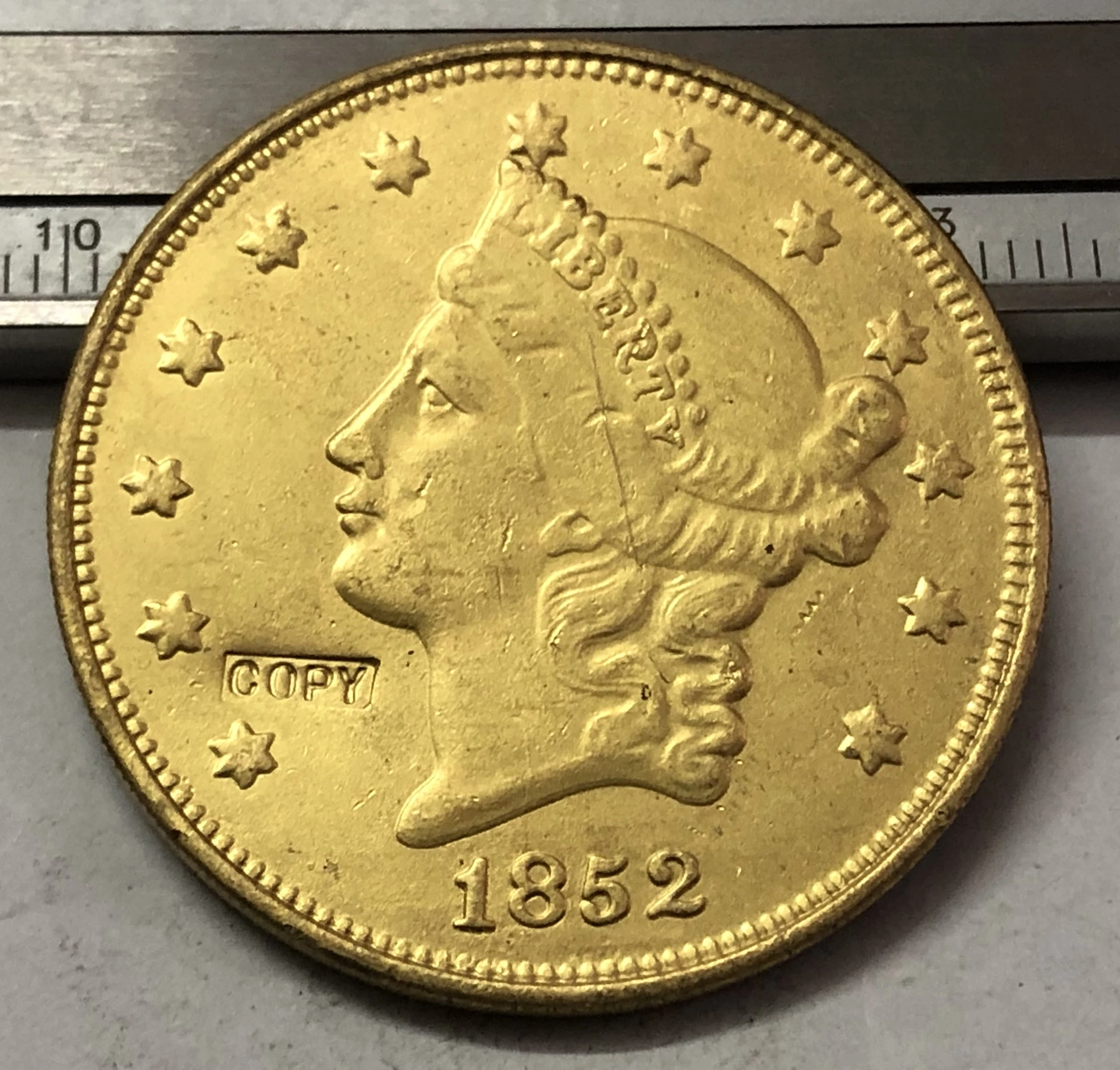 1852 P.O.S United States LIBERTY HEAD (NO MOTTO ON REVERSE) $20 Gold Plated Copy Coin
1852 P.O.S United States LIBERTY HEAD (NO MOTTO ON REVERSE) $20 Gold Plated Copy Coin