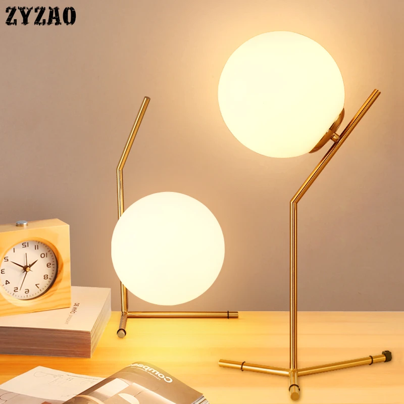 Nordic Simple Glass Ball Table Lamps Art Deco Bedroom Bedside Led Desk Lamp Study Living Room Reading Table Lighting Fixtures 
Nordic Simple Glass Ball Table Lamps Art Deco Bedroom Bedside Led Desk Lamp Study Living Room Reading Table Lighting Fixtures