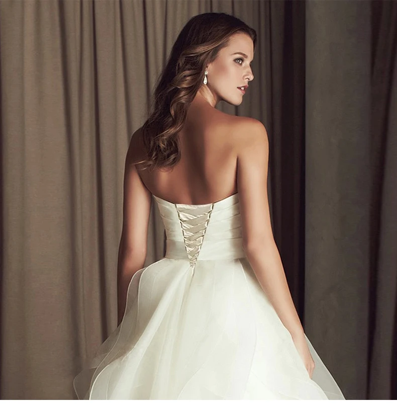 Beauty Emily Elegant tiered Wedding Dresses 2018 flower decorated sashes Princess Bridal Gown Vestido de Noiva strapless dress
Beauty Emily Elegant tiered Wedding Dresses 2018 flower decorated sashes Princess Bridal Gown Vestido de Noiva strapless dress