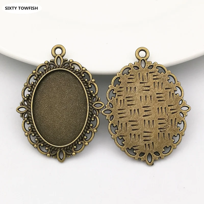 Hot selling 60pcs/lot Inner size:18X25mm Alloy/Metal Antique Bronze Blank Charms Pendant Cameo base Settings DIY Accessory
Hot selling 60pcs/lot Inner size:18X25mm Alloy/Metal Antique Bronze Blank Charms Pendant Cameo base Settings DIY Accessory