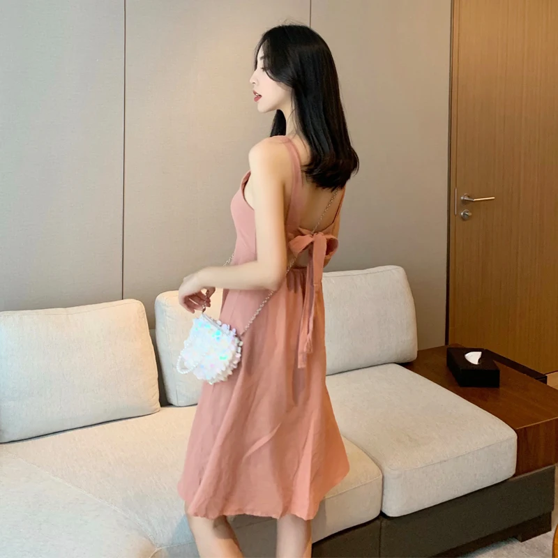 2019 Summer New Korean Style Dress Fashion Sling Sleeveless Single Row Button Back Strap Bow Backless Solid Color Dress Female
2019 Summer New Korean Style Dress Fashion Sling Sleeveless Single Row Button Back Strap Bow Backless Solid Color Dress Female
