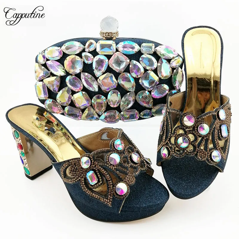 Wonderful back high heel shoes and evening handbag set with crystal stones QSL007 heel height 9cm
Wonderful back high heel shoes and evening handbag set with crystal stones QSL007 heel height 9cm