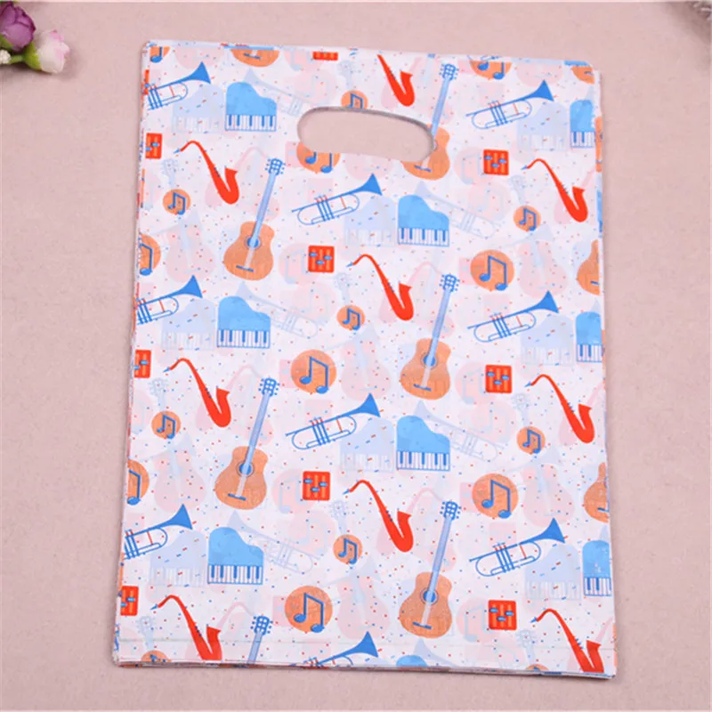 New Design Wholesale 100pcs/lot 25*35cm Fashion Plastic Shopping Bags with Guitar Happy Birthday Cadeau Zakjes
New Design Wholesale 100pcs/lot 25*35cm Fashion Plastic Shopping Bags with Guitar Happy Birthday Cadeau Zakjes