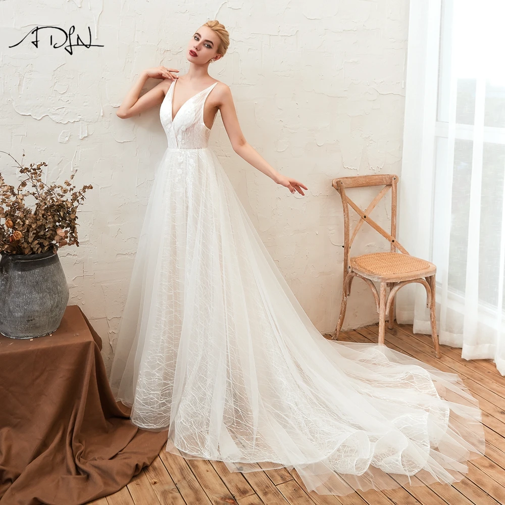 ADLN сексуальный глубокий v-образный вырез кружева свадебное платье Vestido De Noiva Casamento Свадебные платья Boho платье для невесты без спинки с поездо...
ADLN сексуальный глубокий v-образный вырез кружева свадебное платье Vestido De Noiva Casamento Свадебные платья Boho платье для невесты без спинки с поездо...