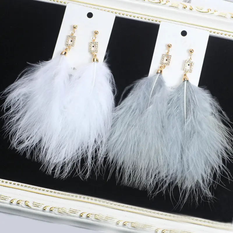 Fairy ostrich feather earrings Personality geometric long feather tassel earrings Women Metal Spiral Geometric Dangle Earrings
Fairy ostrich feather earrings Personality geometric long feather tassel earrings Women Metal Spiral Geometric Dangle Earrings
