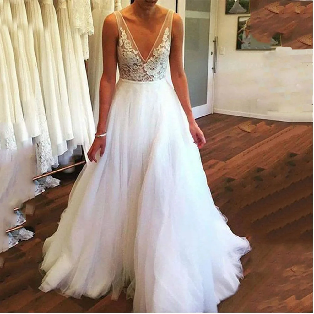 Lace Backless Tulle White Beach Wedding Dresses Deep V-neck Sexy Wedding Gowns Bride Dresses robe de mariee 2019
Lace Backless Tulle White Beach Wedding Dresses Deep V-neck Sexy Wedding Gowns Bride Dresses robe de mariee 2019