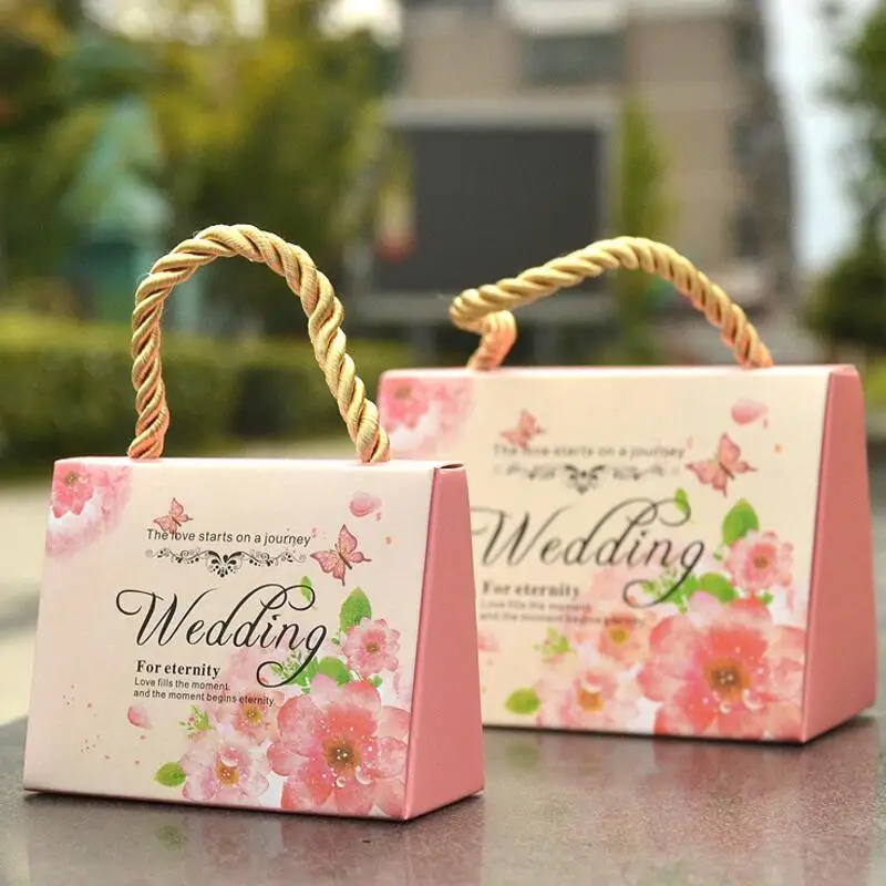 20pcs/pack Wedding Candy Box Sweets Gift Handbag Favor Boxes Party Decoration Wedding Gifts Bag for Guests Wedding Favors
20pcs/pack Wedding Candy Box Sweets Gift Handbag Favor Boxes Party Decoration Wedding Gifts Bag for Guests Wedding Favors