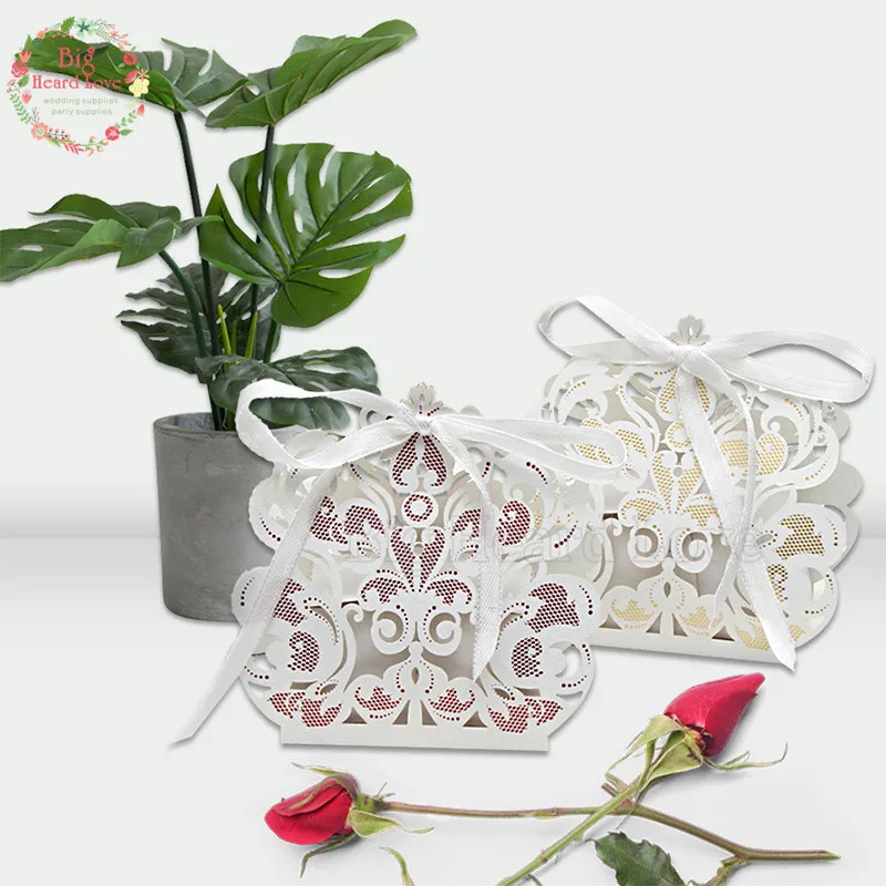 50pcs Flower Lace Laser Cut Candy Boxes Wedding Favors and Gifts Box Wedding Decoration Party Supplies 
50pcs Flower Lace Laser Cut Candy Boxes Wedding Favors and Gifts Box Wedding Decoration Party Supplies
