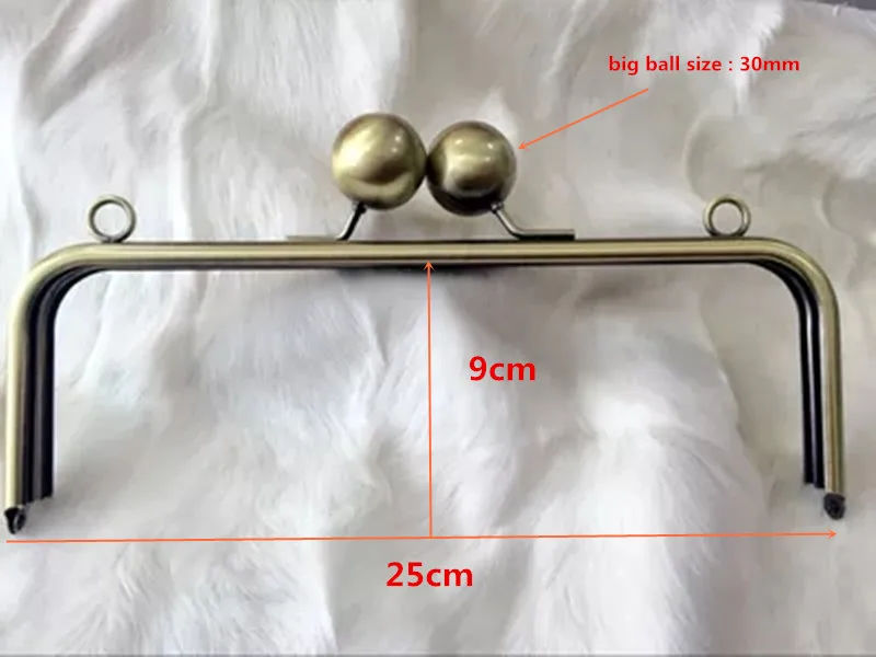 

Wholesale purse frame 25X9 cm with 3 cm big ball ball antique brass color drop ship wallet purse frame handles