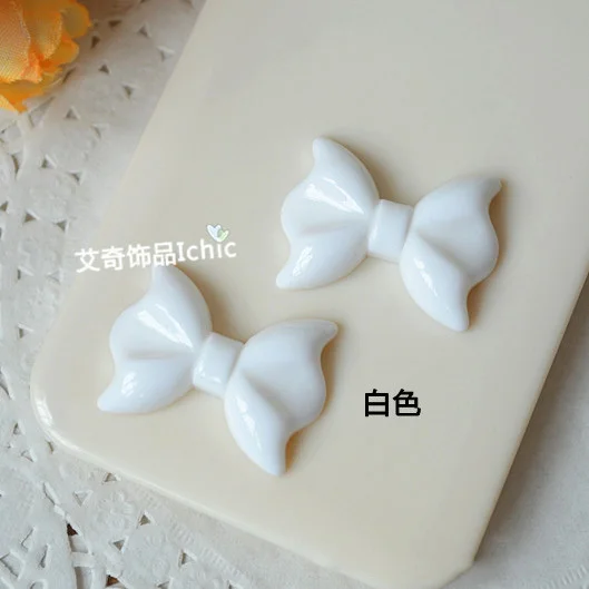 50pcs/lot 21*29mm hot sale cute white and pink bowknot resin flat back cabochon for DIY craft art scrapbooking
50pcs/lot 21*29mm hot sale cute white and pink bowknot resin flat back cabochon for DIY craft art scrapbooking
