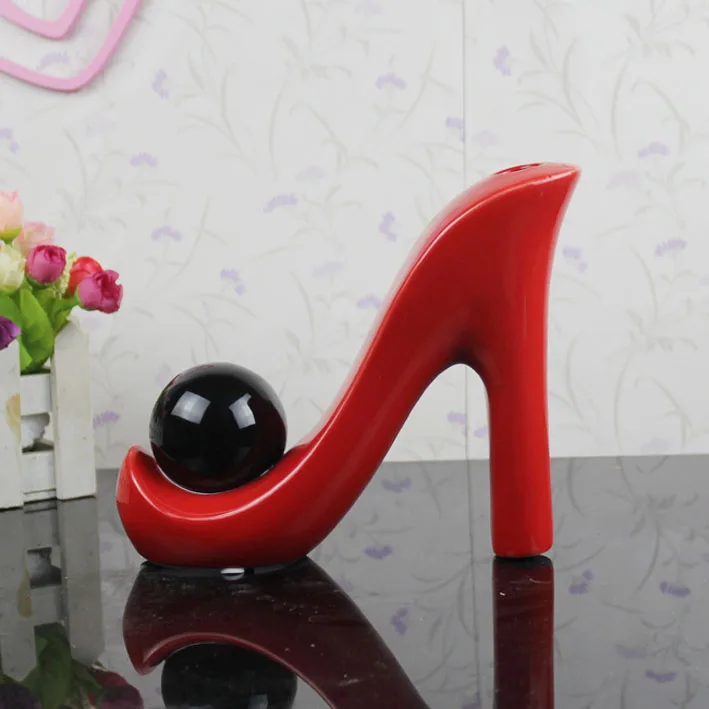 ceramic red High-heeled shoes vase home decor crafts room decoration handicraft ornament porcelain figurines wedding decorations
ceramic red High-heeled shoes vase home decor crafts room decoration handicraft ornament porcelain figurines wedding decorations