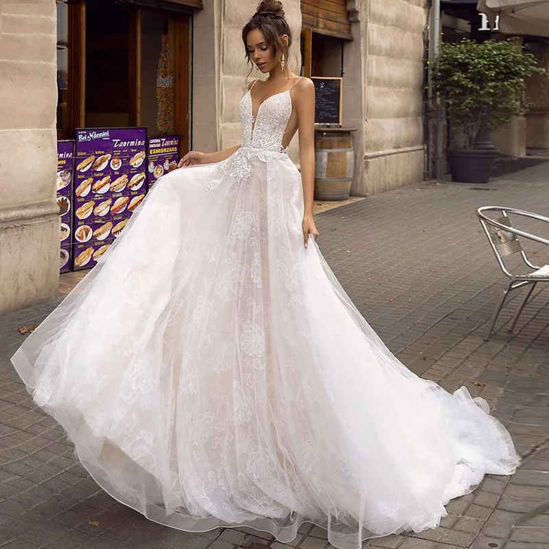 Eightree V-neck Beach Wedding Dress Lace Backless Design Bohemian Wedding Sleeveless Aline Bride Dresses 2019 Appliques Lace
Eightree V-neck Beach Wedding Dress Lace Backless Design Bohemian Wedding Sleeveless Aline Bride Dresses 2019 Appliques Lace