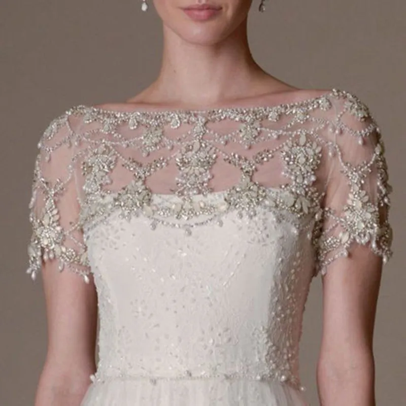 New Bling Luxury Wedding Jackets Rhinestones Shiny Beading Bridal Bolero Wrap Capes White Ivory Short Lace Appliques Jacket
New Bling Luxury Wedding Jackets Rhinestones Shiny Beading Bridal Bolero Wrap Capes White Ivory Short Lace Appliques Jacket