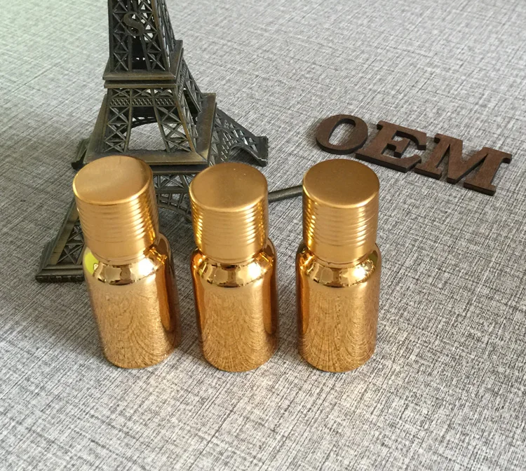 10ml glass essential oil bottle golden plated small bottle aluminum cap refillable makeup sample container packaging 50pcs/lot
10ml glass essential oil bottle golden plated small bottle aluminum cap refillable makeup sample container packaging 50pcs/lot