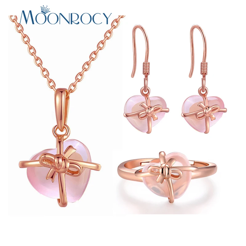 MOONROCY Rose Gold Color Heart Crystal Synthetic Ross Quartz Pink Opal Necklace Earrings and Ring Jewelry Set for Jewelry Women
MOONROCY Rose Gold Color Heart Crystal Synthetic Ross Quartz Pink Opal Necklace Earrings and Ring Jewelry Set for Jewelry Women