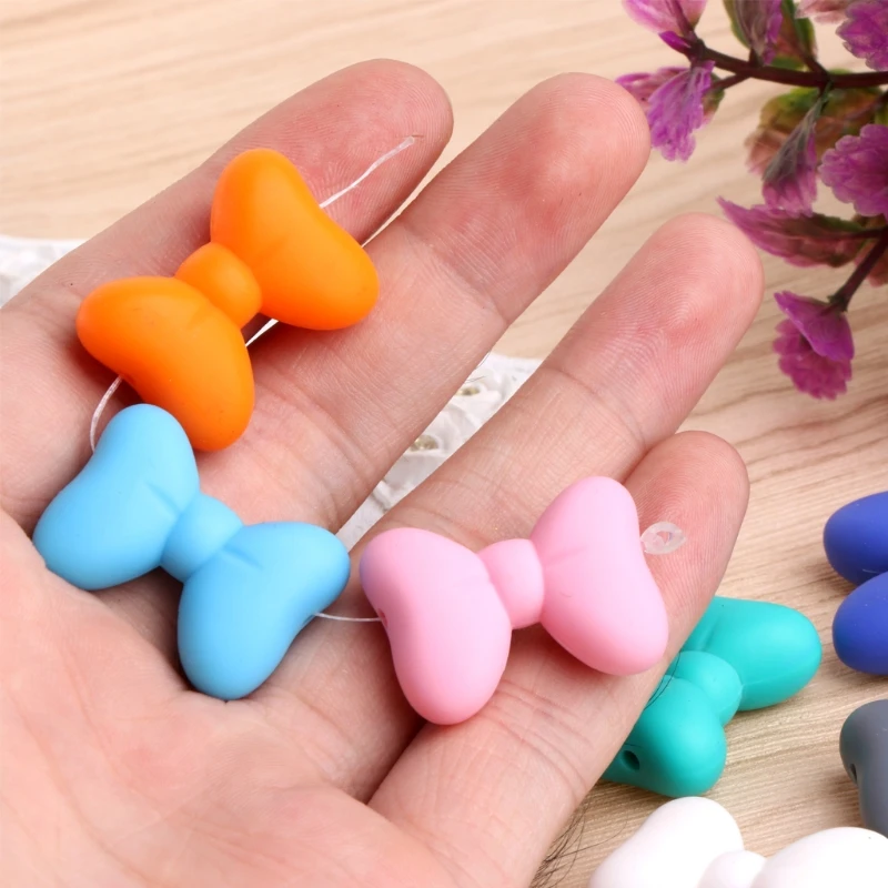 OOTDTY 5 шт. бант силиконовый Прорезыватель для зубов DIY жевательное Ожерелье Подвеска детский Прорезыватель
OOTDTY 5 шт. бант силиконовый Прорезыватель для зубов DIY жевательное Ожерелье Подвеска детский Прорезыватель