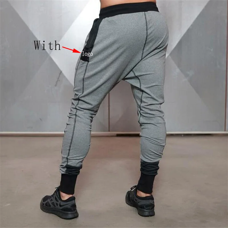 2018 Cotton Men Jogger sportswear Pants Casual Elastic cotton Mens Fitness Workout Pants skinny Sweatpants Trousers Jogger Pants 
2018 Cotton Men Jogger sportswear Pants Casual Elastic cotton Mens Fitness Workout Pants skinny Sweatpants Trousers Jogger Pants