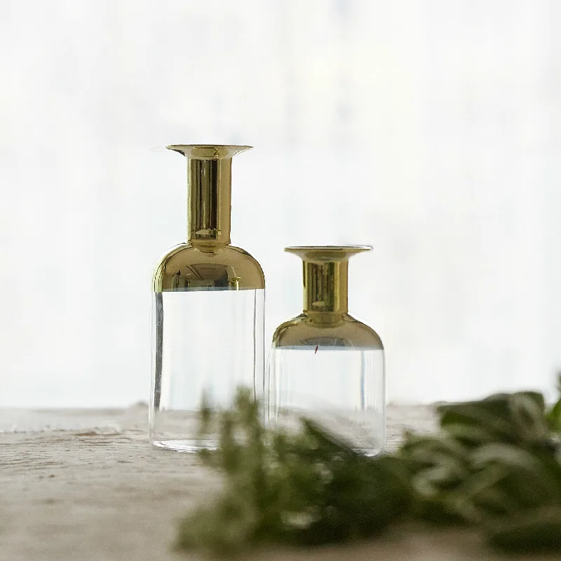 Simple electroplated golden glass vase Nordic aromatherapy bottle desk water culture flower dried flowers
Simple electroplated golden glass vase Nordic aromatherapy bottle desk water culture flower dried flowers