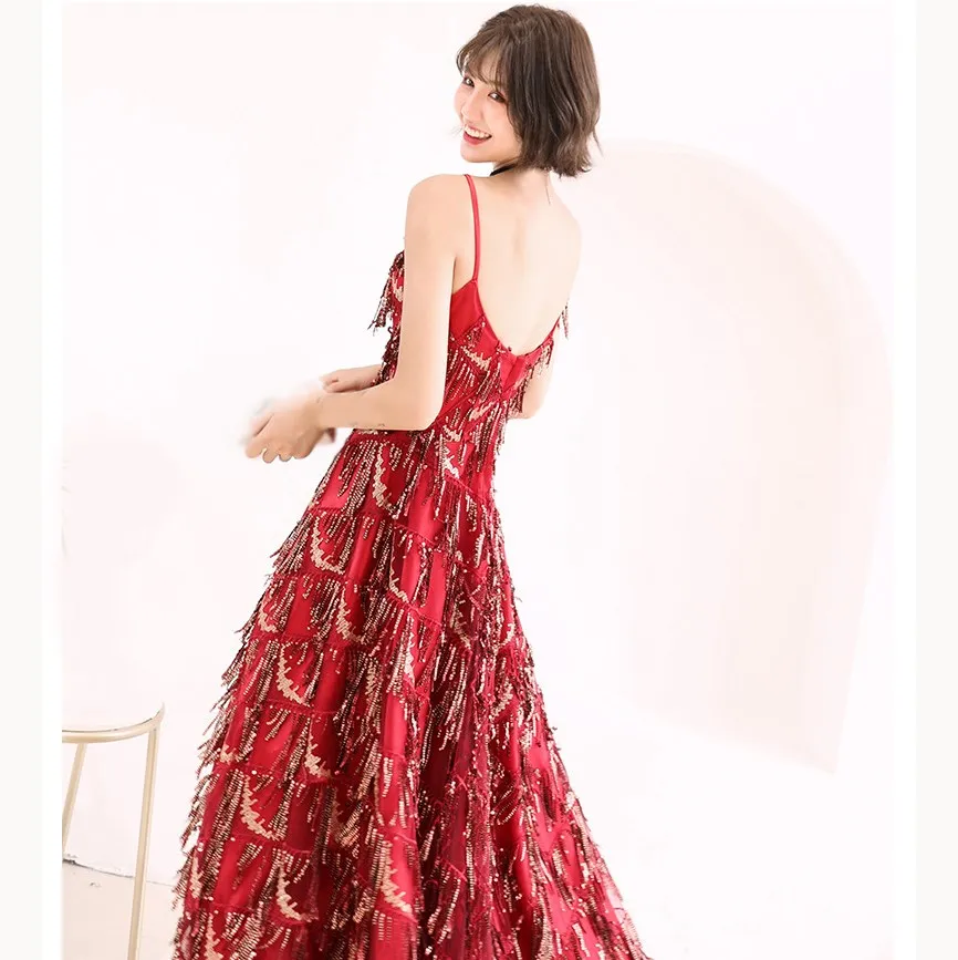 Women Spaghetti Strap Sequin Dress Vintage Backless Tassel Long Dress A-Line Party Dress
Women Spaghetti Strap Sequin Dress Vintage Backless Tassel Long Dress A-Line Party Dress