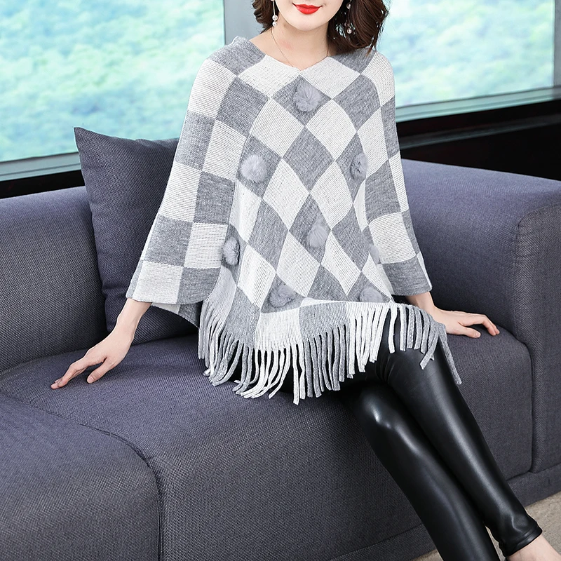 New Cloak Sweater Women Tops Plaid Tassels Loose Women Sweater Shawl Villus Batwing Sleeve Sweaters
New Cloak Sweater Women Tops Plaid Tassels Loose Women Sweater Shawl Villus Batwing Sleeve Sweaters