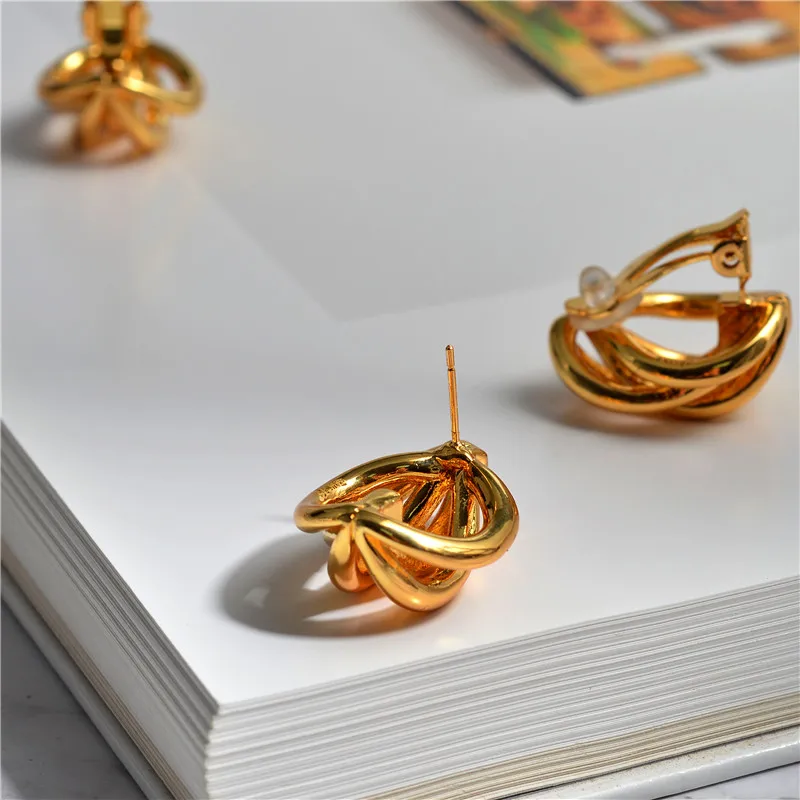 Copper gold simple cross spiral personality temperament wild temperament personality ear clip earrings
Copper gold simple cross spiral personality temperament wild temperament personality ear clip earrings