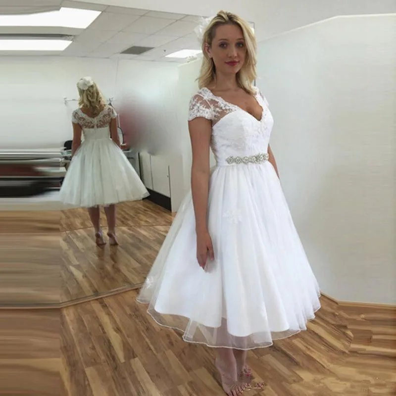 Cheap A-Line short Wedding Dresses 2021 Lace Applique V-Neck Tea Length wedding gown Beaded Sash Bridal Gowns vestidos de novia
Cheap A-Line short Wedding Dresses 2021 Lace Applique V-Neck Tea Length wedding gown Beaded Sash Bridal Gowns vestidos de novia