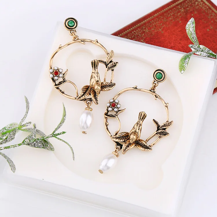 White Flower Pattern Boho Birds Round Women Crystal Vintage Alloy Golden Simulated Pearl High Quality Dangle Earrings
White Flower Pattern Boho Birds Round Women Crystal Vintage Alloy Golden Simulated Pearl High Quality Dangle Earrings