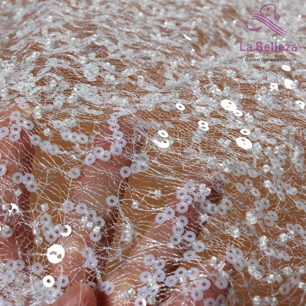 La Belleza New bridal fabric beaded with matt and clear sequins embroidery wedding dress lace fabric 1 yard
La Belleza New bridal fabric beaded with matt and clear sequins embroidery wedding dress lace fabric 1 yard