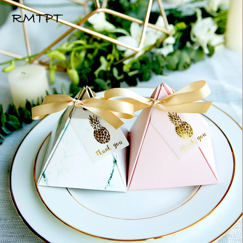 RMTPT 100pcs/lot High-quality Triangular Pyramid Style Candy Box Baby Shower Wedding Favors Party Supplies Paper Gift Boxes
RMTPT 100pcs/lot High-quality Triangular Pyramid Style Candy Box Baby Shower Wedding Favors Party Supplies Paper Gift Boxes