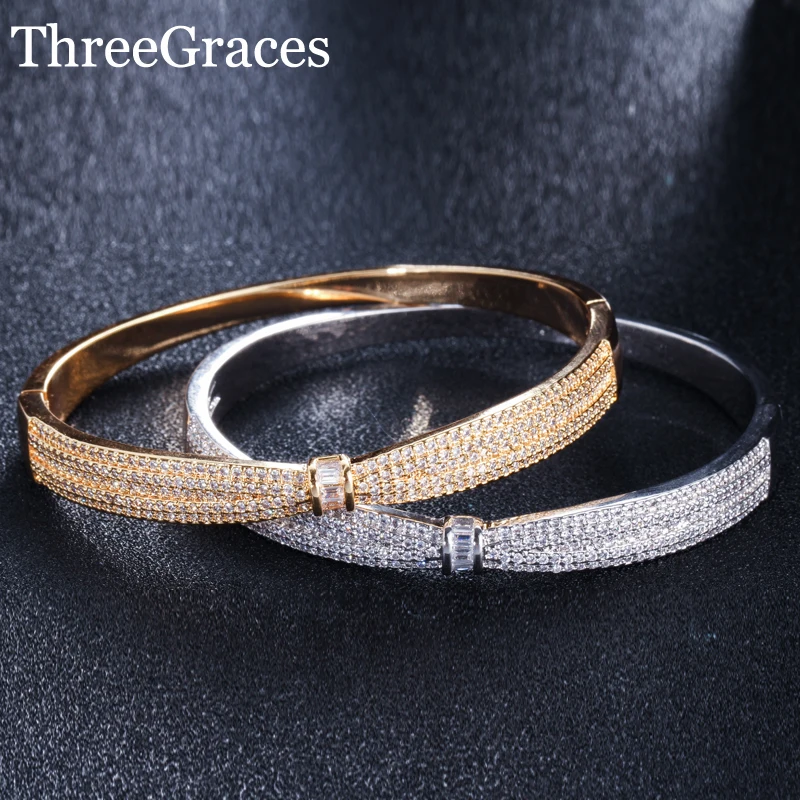 ThreeGraces Summer New Micro Paved Cubic Zirconia Crystal Stone Gold Color Bowknot Shape Cuff Bangle for Women Jewelry BA023
ThreeGraces Summer New Micro Paved Cubic Zirconia Crystal Stone Gold Color Bowknot Shape Cuff Bangle for Women Jewelry BA023