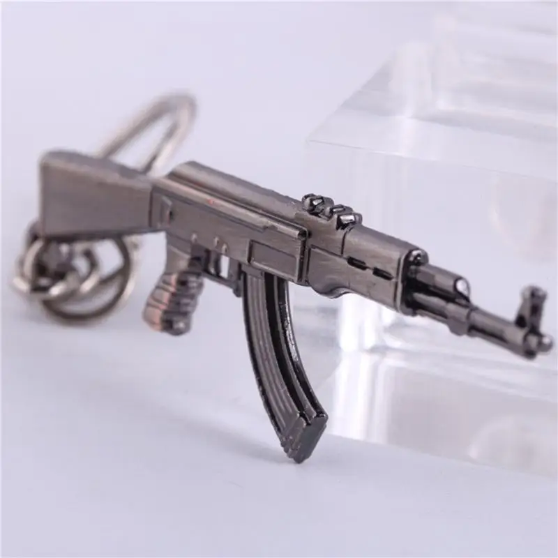 Cool Pop Game CF Cross Fire AK47 Gun Weapon Model Metal Pendant Keychain Punk Rock Men Jewelry Metal Key Rings Wholesale
Cool Pop Game CF Cross Fire AK47 Gun Weapon Model Metal Pendant Keychain Punk Rock Men Jewelry Metal Key Rings Wholesale
