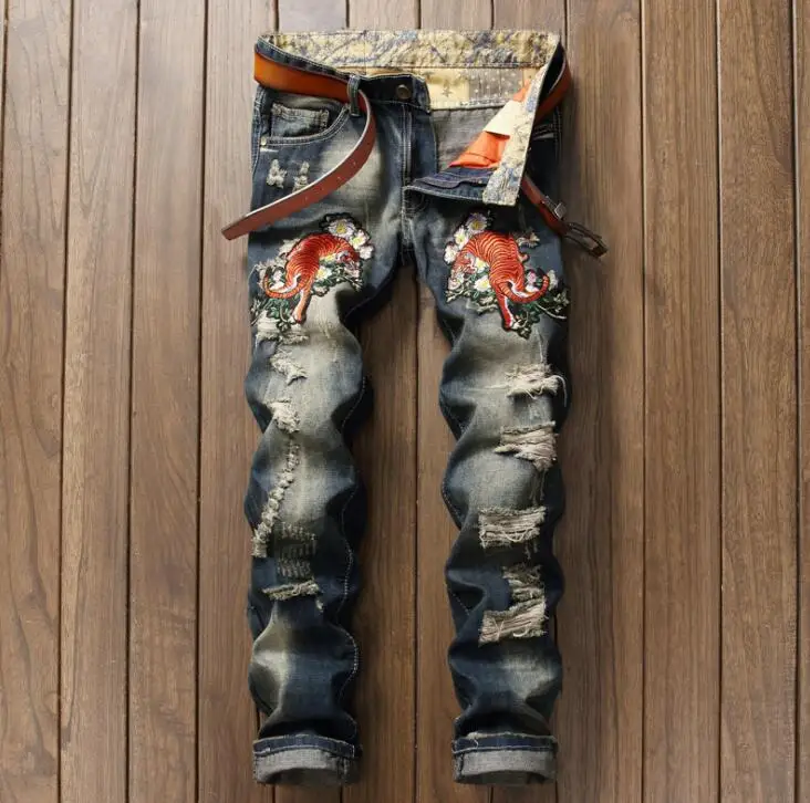 Hole patch jeans men Embroidered tiger jeans men trousers male denim pants masculino motorcycle fashion designer
Hole patch jeans men Embroidered tiger jeans men trousers male denim pants masculino motorcycle fashion designer