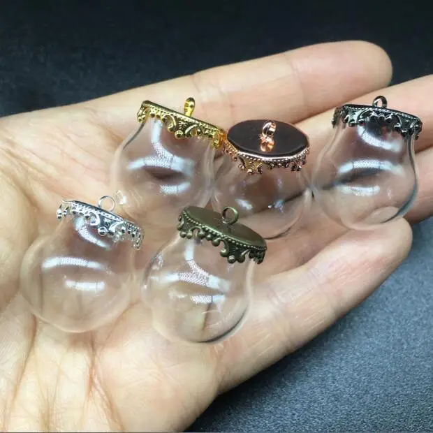 10sets 20*15mm Miniature glass globe orbs bubble metal crown base tray jewelry necklace lanugo vial pendant DIY wishing bottles
10sets 20*15mm Miniature glass globe orbs bubble metal crown base tray jewelry necklace lanugo vial pendant DIY wishing bottles