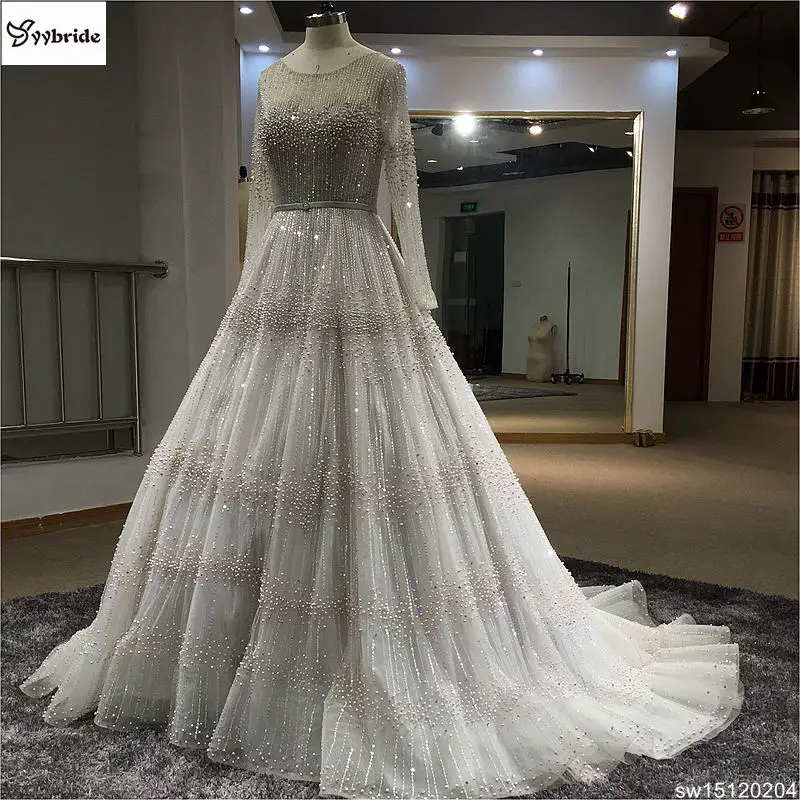 New Arrived Customized Hand Sewing Pearls Wedding Dress A-line Long Royal Train Bridal Gown Boat Neck Backless Wedding dresses
New Arrived Customized Hand Sewing Pearls Wedding Dress A-line Long Royal Train Bridal Gown Boat Neck Backless Wedding dresses