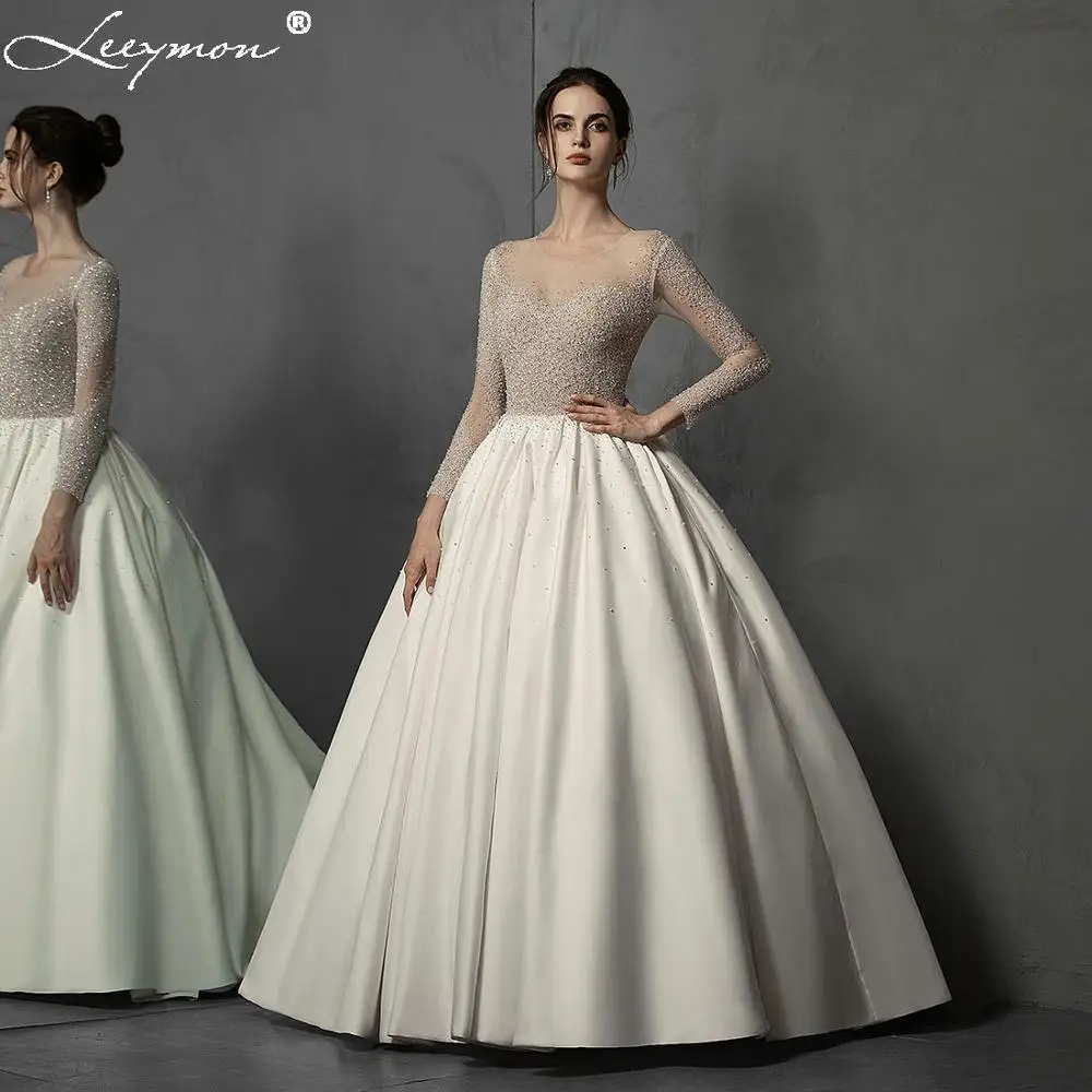 Leeymon Luxury Beaded Stones Crystals Wedding Dress Floor-Length Full Sleeves Wedding Ball Gown Robe de Mariee Bridal Gown
Leeymon Luxury Beaded Stones Crystals Wedding Dress Floor-Length Full Sleeves Wedding Ball Gown Robe de Mariee Bridal Gown