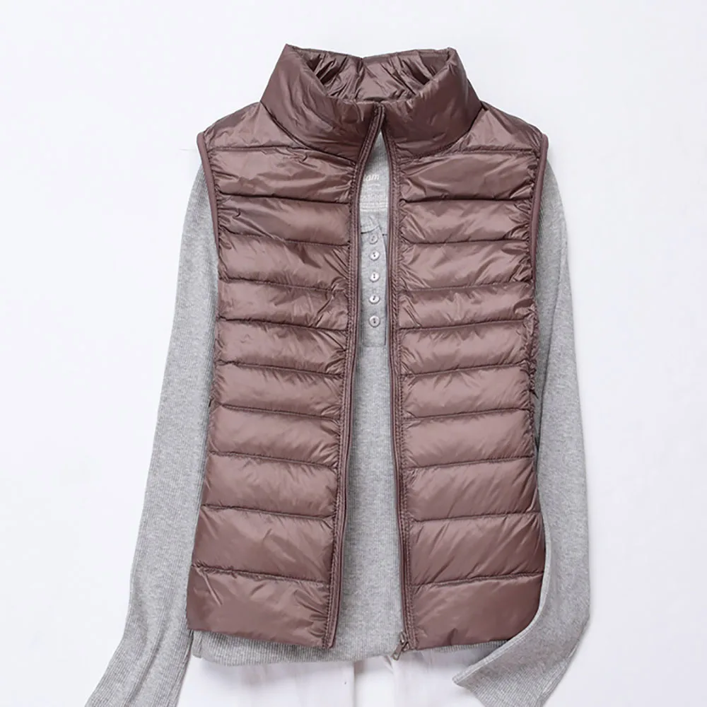 Women Sleeveless Jacket Autumn Ultralight White Duck Down Vest Female Slim Vest New Winter Brand Womens Windproof Warm Waistcoat
Women Sleeveless Jacket Autumn Ultralight White Duck Down Vest Female Slim Vest New Winter Brand Womens Windproof Warm Waistcoat