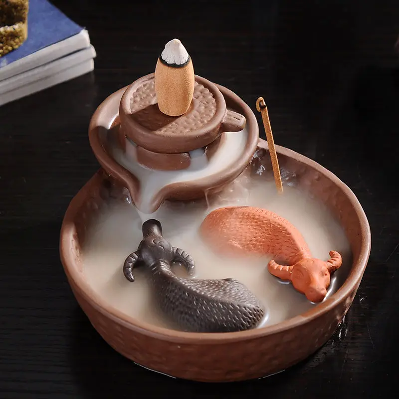 BackFlow Incense Burner Sticks Holder Living Tea Room Smell Removing Tool Cense Burner Buddhist Buddhist Home Decor Z258
BackFlow Incense Burner Sticks Holder Living Tea Room Smell Removing Tool Cense Burner Buddhist Buddhist Home Decor Z258