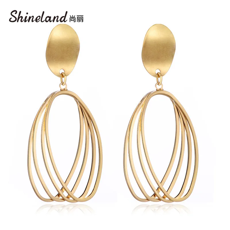 Shineland 2021 New Vintage Smooth Metal Round Hollow Fashion Punk Statement Drop Earrings For Women Brincos Jewelry
Shineland 2021 New Vintage Smooth Metal Round Hollow Fashion Punk Statement Drop Earrings For Women Brincos Jewelry