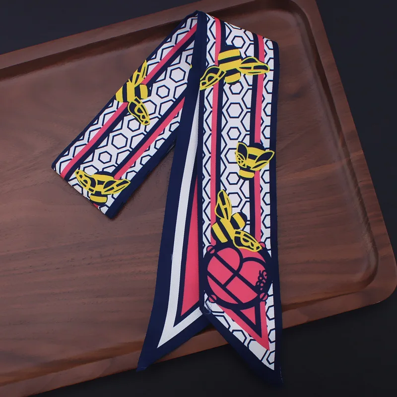 2018 new Geometric bee small ribbon tied bag handle silk scarf hair towel Head Scarf Handle Bag Ribbon Long Scarves for women
2018 new Geometric bee small ribbon tied bag handle silk scarf hair towel Head Scarf Handle Bag Ribbon Long Scarves for women