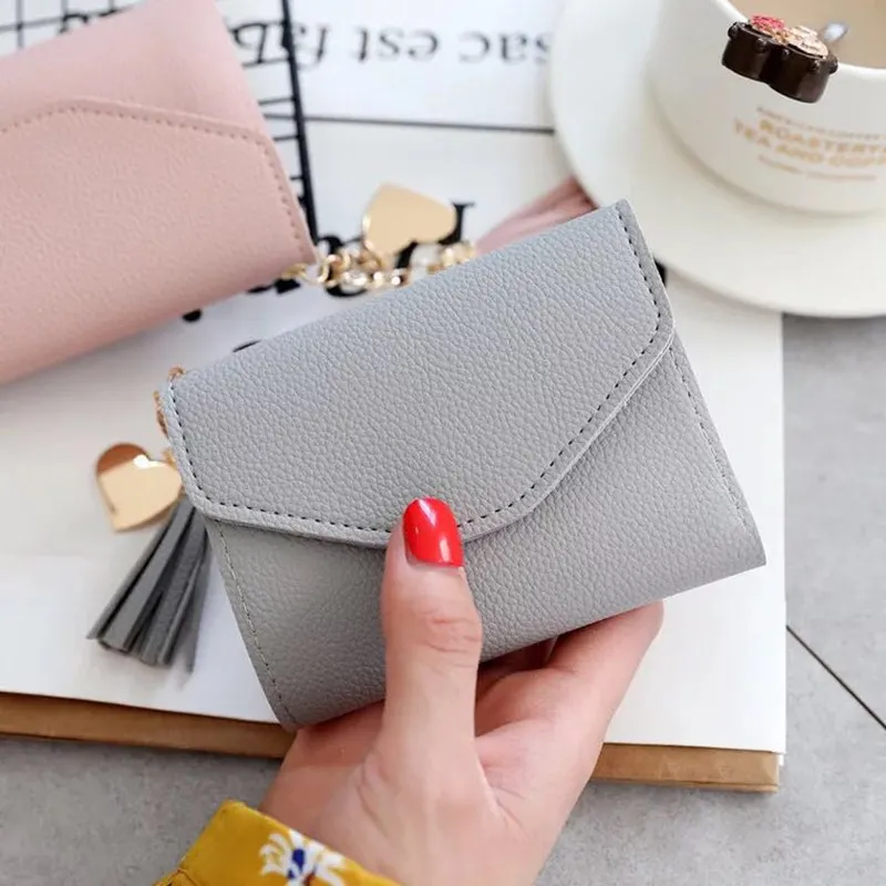 New Design High Quality Fashion Brand Leather Women Wallets Short Thin ladies coin Purse Cards Holder Clutch bag tassel Wallet f
New Design High Quality Fashion Brand Leather Women Wallets Short Thin ladies coin Purse Cards Holder Clutch bag tassel Wallet f