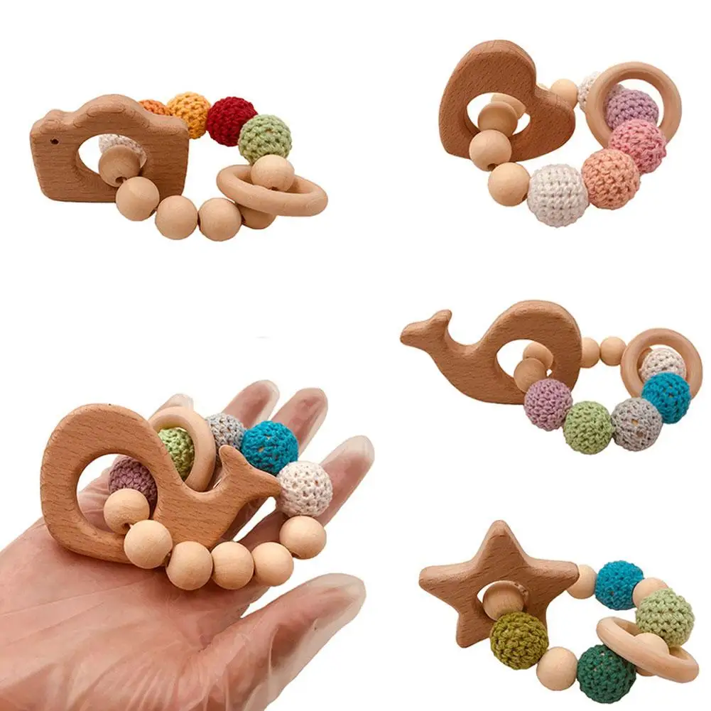 Baby Toy Wooden Pram Clip Pacifier Baby Wooden Beads Baby Bracelet Wheal Heart Star Camera Shape Teething Teether Toy
Baby Toy Wooden Pram Clip Pacifier Baby Wooden Beads Baby Bracelet Wheal Heart Star Camera Shape Teething Teether Toy