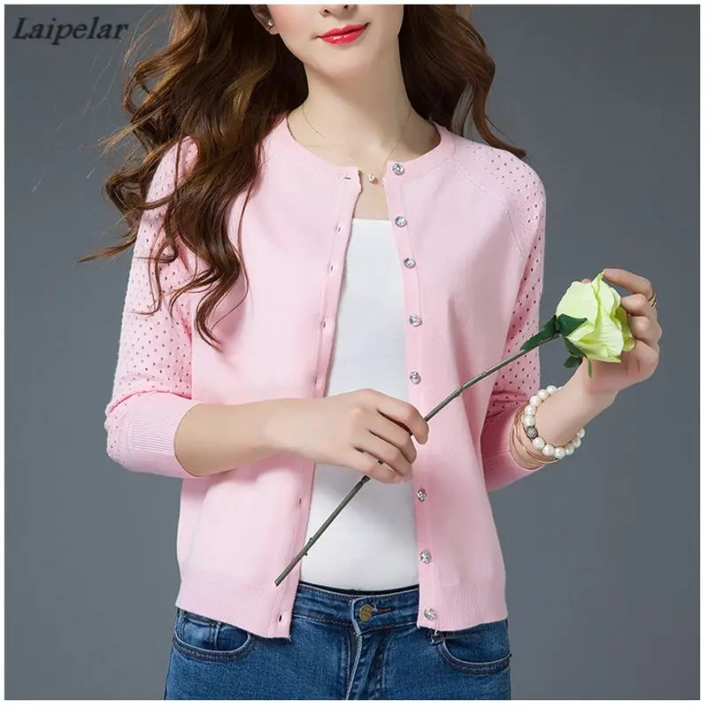 new spring thin sweater cardigan sweater female hollow short sleeved sweater shawl a little coat of air conditioning
new spring thin sweater cardigan sweater female hollow short sleeved sweater shawl a little coat of air conditioning