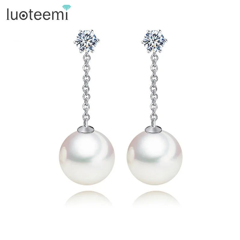 LUOTEEMI White Gold-Color Korean Superstar Design Elegant White Round Imitation Pearl Pendant Chandelier Earrings For Women
LUOTEEMI White Gold-Color Korean Superstar Design Elegant White Round Imitation Pearl Pendant Chandelier Earrings For Women