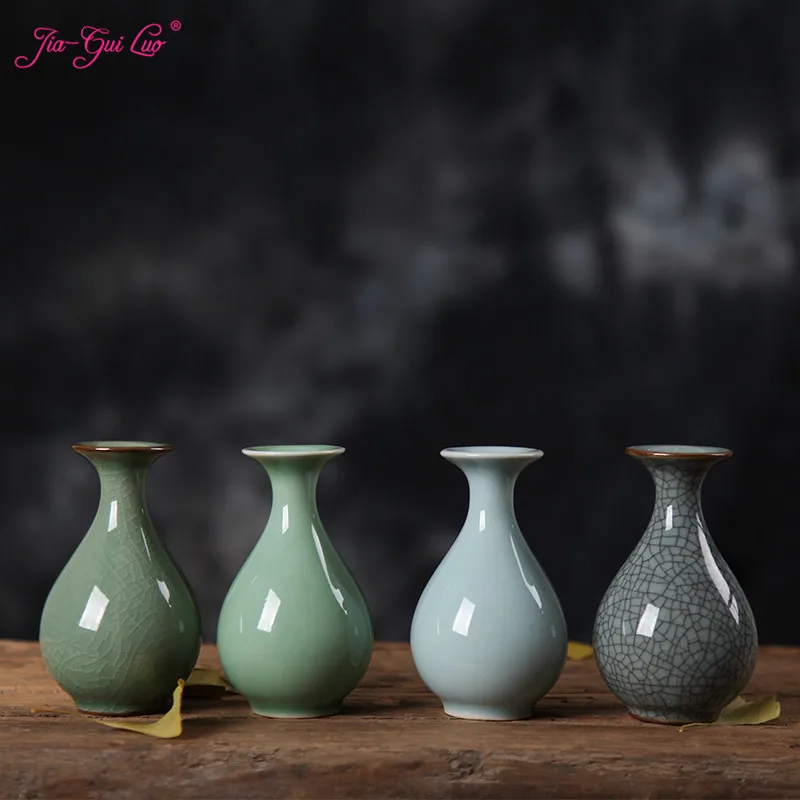 JIA-GUI LUO Ice crack Celadon creative decoration personality flower home decoration water culture flower ceramic vase C051
JIA-GUI LUO Ice crack Celadon creative decoration personality flower home decoration water culture flower ceramic vase C051