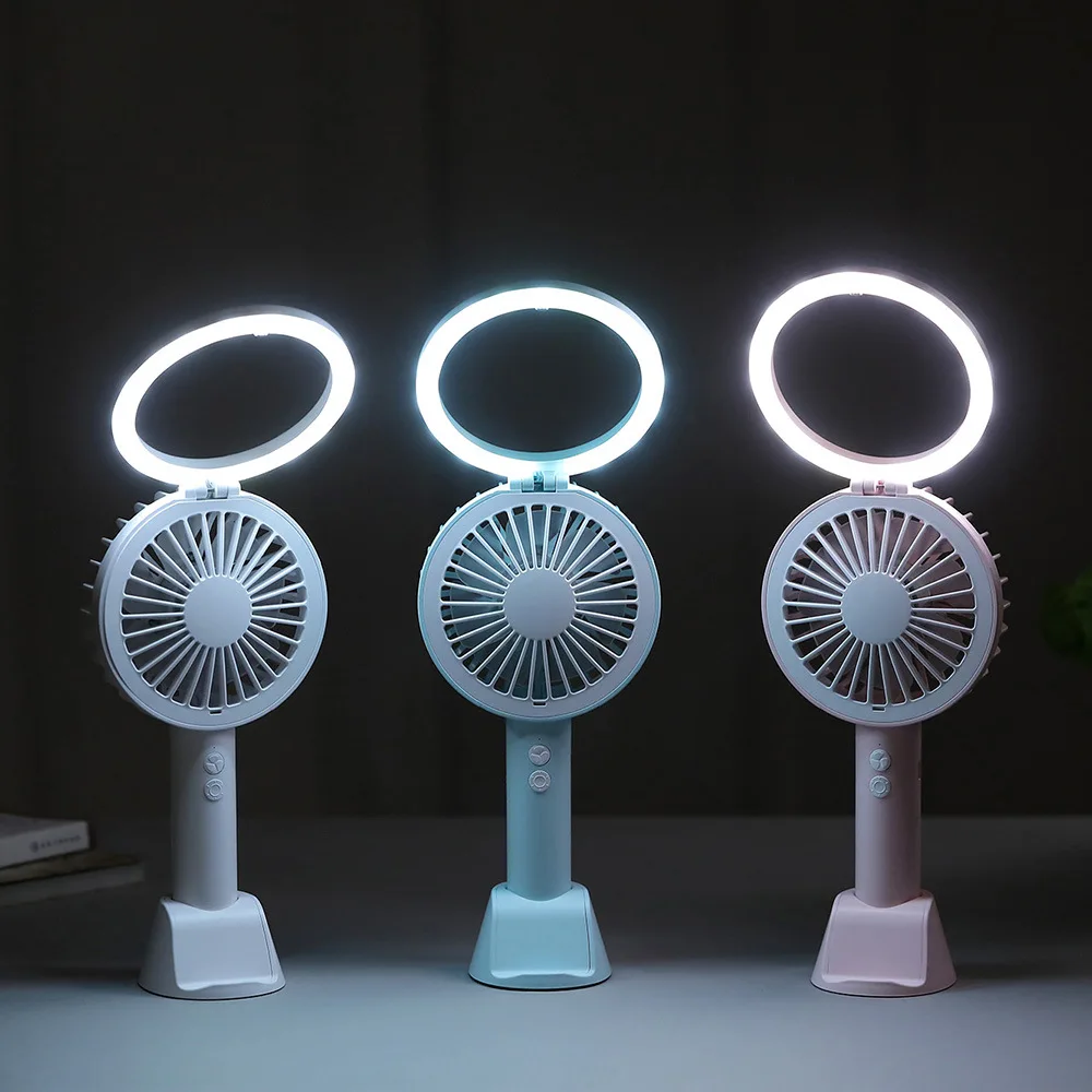 3 In 1 5V Mini USB Handheld Desktop Fan 3 Modes Cooling Wind Speed LED Light Phone Holder
3 In 1 5V Mini USB Handheld Desktop Fan 3 Modes Cooling Wind Speed LED Light Phone Holder