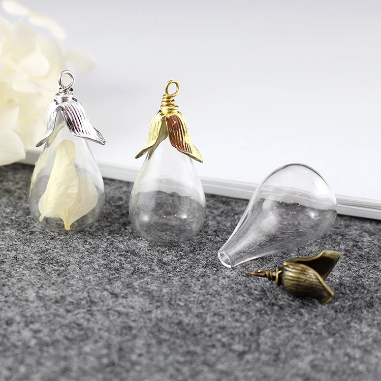 2PCS 31X18MM Flat Drop Bottom bulb vase glass With Twisted Metal Caps DIY glass Vials Pendants jewelry accessory
2PCS 31X18MM Flat Drop Bottom bulb vase glass With Twisted Metal Caps DIY glass Vials Pendants jewelry accessory
