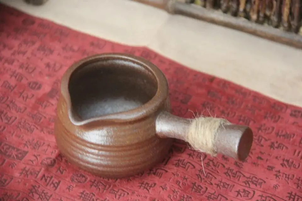

Cha Hai Rough pottery Retro Kiln change Fair cup puer tea sets Side to side Tea sea Sub-tea